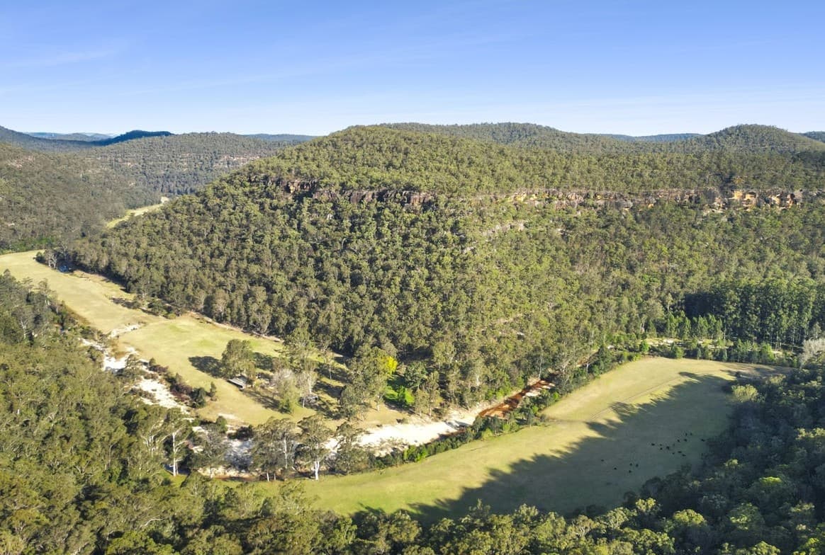 Cleared flats within the forested ranges