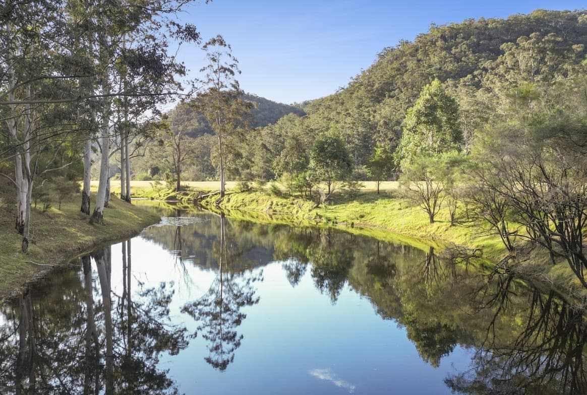 Still waterhole on Webbs Creek reflecting the ranges