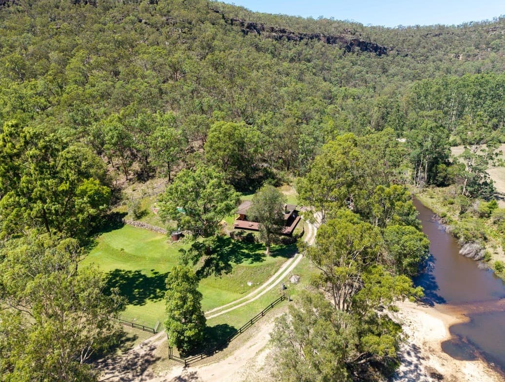 Aerial of a house site beside the creek